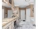 Spacious bathroom with a double vanity and granite countertops at 1037 Windermere Xing, Cumming, GA 30041