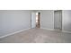 Neutral bedroom featuring carpet and doorway entrance at 1037 Windermere Xing, Cumming, GA 30041
