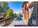 Expansive deck with outdoor dining set overlooking the serene backyard at 1037 Windermere Xing, Cumming, GA 30041