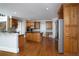 Gourmet kitchen featuring custom wood cabinetry, granite countertops, and stainless steel appliances at 1037 Windermere Xing, Cumming, GA 30041