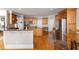 Spacious kitchen with custom wood cabinets, stainless steel appliances, and granite countertops at 1037 Windermere Xing, Cumming, GA 30041