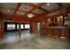 Fully paneled room with recessed lights, a service bar and tile flooring at 1037 Windermere Xing, Cumming, GA 30041