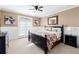 Main bedroom with neutral walls, french doors, and white trim at 1037 Windermere Xing, Cumming, GA 30041