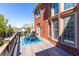 Outdoor patio with brick exterior, table, chairs, and a beautiful view at 1037 Windermere Xing, Cumming, GA 30041