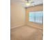Cozy bedroom with a ceiling fan and a bright window at 1705 Rolling View Dr, Cumming, GA 30040