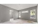 Gray bedroom with natural light and ample space ready for customization at 2650 Roswell Rd, Marietta, GA 30062
