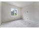 Bright bedroom featuring a large window with a view to the outside and ample natural light during construction at 2650 Roswell Rd, Marietta, GA 30062