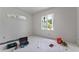 Unfinished bedroom with two windows providing natural light and views of the exterior at 2650 Roswell Rd, Marietta, GA 30062