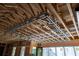 Detailed view of a metal frame ceiling, showcasing the construction and beams above a room's window at 2650 Roswell Rd, Marietta, GA 30062