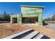 New construction of a house featuring a garage with a ladder and green exterior sheathing at 2650 Roswell Rd, Marietta, GA 30062