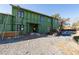 Construction of a two-story home featuring green sheathing and a gravel lot at 2650 Roswell Rd, Marietta, GA 30062