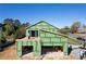 Under-construction home exterior with sliding doors and a spacious outdoor deck at 2650 Roswell Rd, Marietta, GA 30062