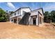 Rear view showing the home's modern design with staircase leading to the upper level during construction at 2650 Roswell Rd, Marietta, GA 30062
