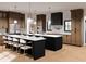 Spacious kitchen with modern stainless steel appliances, two large islands, and beautiful hardwood floors at 2650 Roswell Rd, Marietta, GA 30062