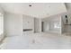Open-concept living space featuring recessed lighting, fireplace niche, and large windows at 2650 Roswell Rd, Marietta, GA 30062