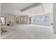 Bright open-concept living space with recessed lighting and large windows at 2650 Roswell Rd, Marietta, GA 30062