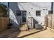 This fenced backyard features a brick wall, steps, and AC unit at 1687 Briarcliff Ne Rd # 8, Atlanta, GA 30306