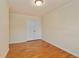 This bedroom has hardwood floors, neutral walls, and a closet at 1687 Briarcliff Ne Rd # 8, Atlanta, GA 30306