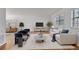 Bright living room with modern furniture, hardwood floors, and a large window at 1687 Briarcliff Ne Rd # 8, Atlanta, GA 30306