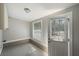 Mud room features tile floors and a door to the exterior at 1800 E Lake Rd, Mcdonough, GA 30252