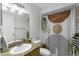 Bathroom featuring a modern vanity, decorative shower curtain, and neutral tile flooring at 2955 Seven Pines Se Ln # 203, Atlanta, GA 30339