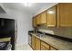 Modern kitchen with updated appliances, granite countertops, and ample cabinet space at 2955 Seven Pines Se Ln # 203, Atlanta, GA 30339
