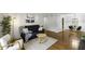 Bright and airy living room with modern decor flowing into the dining area at 2955 Seven Pines Se Ln # 203, Atlanta, GA 30339