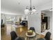 Open-concept living space showcasing living, dining, and kitchen areas with lots of natural light at 2955 Seven Pines Se Ln # 203, Atlanta, GA 30339
