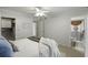 Spacious main bedroom includes walk-in closet, stylish decor, and a view into the bathroom at 2955 Seven Pines Se Ln # 203, Atlanta, GA 30339