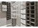 Walk-in closet with custom shelving and storage solutions for organized living at 195 14Th Ne St # 2402, Atlanta, GA 30309