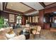 Well-appointed clubhouse lounge area with stylish furnishings and access to an outdoor patio at 195 14Th Ne St # 2402, Atlanta, GA 30309