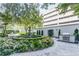 Beautiful courtyard featuring a fountain, garden, and outdoor grill at 195 14Th Ne St # 2402, Atlanta, GA 30309