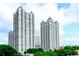 Stunning exterior view of two high-rise condo buildings with manicured landscaping and blue skies at 195 14Th Ne St # 2402, Atlanta, GA 30309