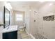 Bathroom featuring a modern sink, commode and large marble shower at 54 Jean Ct, Hiram, GA 30141