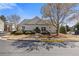Inviting home with a manicured front yard, showcasing neat landscaping and a charming entryway at 281 Hiawassee Dr, Woodstock, GA 30188
