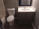 Bathroom with modern vanity, toilet, and fixtures, offering a clean and functional space at 359 Cedar Ridge Trl, Lawrenceville, GA 30046