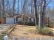Charming brick ranch-style home with an attached garage and well-kept front yard at 359 Cedar Ridge Trl, Lawrenceville, GA 30046