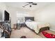Bedroom with a ceiling fan and natural light at 625 Sycamore Glen Nw Ct, Lawrenceville, GA 30044