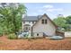 A well-maintained backyard with a deck, a grill, and a place to enjoy outdoor life at 1945 Wenlok Ne Trl, Marietta, GA 30066
