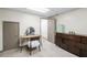Bedroom with a makeup vanity and large dresser with a light neutral carpet at 1945 Wenlok Ne Trl, Marietta, GA 30066