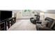 Spacious bonus room with recliner seating and television at 1945 Wenlok Ne Trl, Marietta, GA 30066