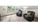 Bonus room with recliner seating and a window for natural light at 1945 Wenlok Ne Trl, Marietta, GA 30066