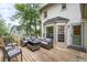 Outdoor deck with comfortable wicker furniture, ideal for relaxing and entertaining at 1945 Wenlok Ne Trl, Marietta, GA 30066