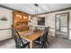 Dining room featuring a modern light fixture, wood hutch, and stylish decor at 1945 Wenlok Ne Trl, Marietta, GA 30066