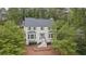 Charming two-story home with a landscaped yard and a welcoming front entrance at 1945 Wenlok Ne Trl, Marietta, GA 30066