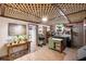 Charming kitchen area with an island cart with seating and a unique wood lattice ceiling at 1945 Wenlok Ne Trl, Marietta, GA 30066