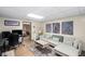 Cozy living room area with comfortable seating and stylish decor and artistic wall paintings at 1945 Wenlok Ne Trl, Marietta, GA 30066