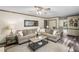 Comfortable living room with neutral furniture, coffee table, and hardwood floors at 1945 Wenlok Ne Trl, Marietta, GA 30066