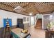 Relaxing living area with hardwood floors, a decorative ceiling and access to the staircase at 1945 Wenlok Ne Trl, Marietta, GA 30066