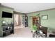 Well lit home office with decorative trim, large windows and neutral carpet at 1945 Wenlok Ne Trl, Marietta, GA 30066